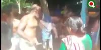 Man Savagely Beaten By Bald Punisher In Indian Village