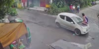 Philippino Robber Takes a Ride On The Hood