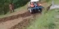 Moron Behind the Wheel of a Tractor