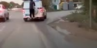 Suspect Transported Outside Patrol Vehicle In Russia