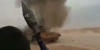 SAA T-72 takes a hit in some shitty desert
