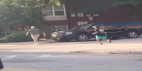 "PEACEFUL PROTESTER" BLINDSIDES BUY WITH A BRICK