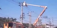 Worker welding himself to a pole!