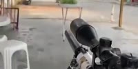 Trafficker Films Himself Pointing Sniper Rifle At Armored Police Vehicle In Favelas