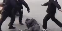Chinese cops beat guy