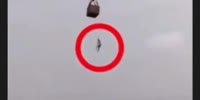 Dude in red circle falls to his death.