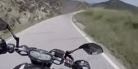 Motorcyclist crashes into truck (R)