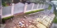 Wall Tumbles Crushing Vietnamese Woman