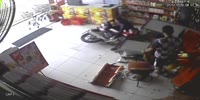 Biker smashes into storeowner and customer