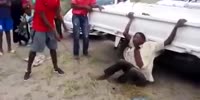 African Thief Gets Feet Flogged