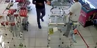 Thug Shoots Female Clerk