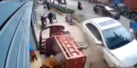 Female Driver Injures 2 In China