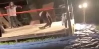 Fighter breaks both knees. (R)