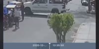 Reversing Police Pick Up Truck Knocks Out Distracted Male In Mexico
