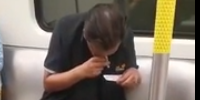 Dude Calmly Takes Drugs On Subway Train In Hong Kong