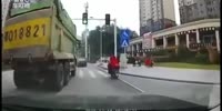 Biker Crushed by Truck in China