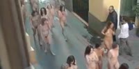 Thousands of women run 'naked' through the city streets in a mysterious competition (R)