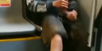 Guy showing his Twinky in the bus.