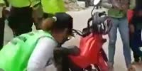 Biker calls traffic agent to beat