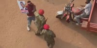 African Soldiers Beat Protester