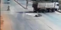 Biker Gets Destroyed By Dump Truck