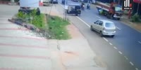 Biker Pushed Under The Truck