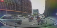 Biker ran over by truck