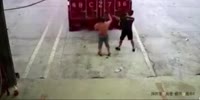 Chinese worker crushed by trailer