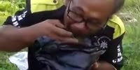Man eats nails (R)