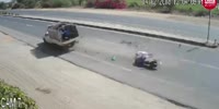 Biker hit by high speed truck