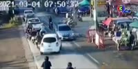 white car goes rogue and pins biker