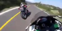 Biker Drives Off A Cliff