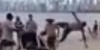 Double Flying Kick For Abusive Beach Shit Talker