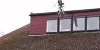 Insane jump over a house on a pedal bike.