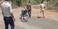 Indian Police Beat Man With Stick