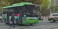 Reckless Man Gets Run Over By Bus In China
