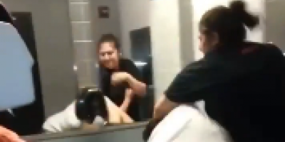 Bathroom slap fight