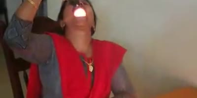 Crazy Woman Eats Fire