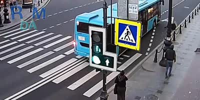 Distracted Blonde Knocked Out By Bus In St. Petersburg, Russia