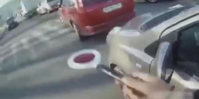 Russian Cop Catches a Ride