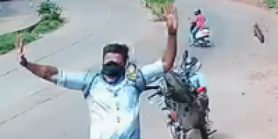 Idiot on Moped Causes Biker to do an Epic Stunt