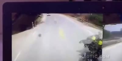 Truck Flipped Onto Car After Biker Cuts It Off