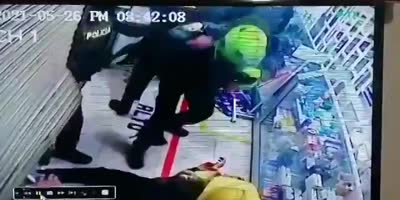 Protesters Try To Hide In The Store But Cops Slam In & Beat Them Cruelly (Colombia)