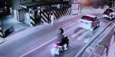 Woman hit by delivery truck