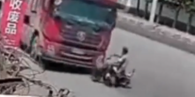 the Red Truck Claims Another Biker