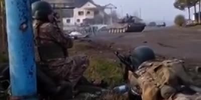 A tank resisting a big explosion during a shootout (R)