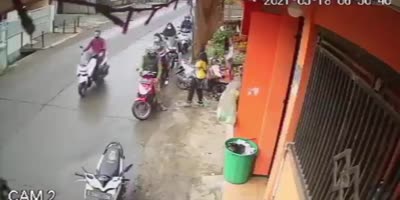 Scooter Rider Falls Head First Under Box Truck Wheels