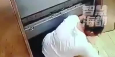 Man falls to death trying to get out of broken elevator