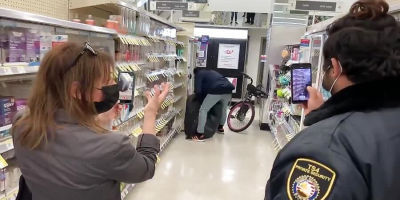 Dude robs store in front of security