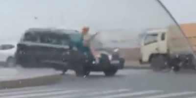 Russian Woman Wrecked at Crosswalk